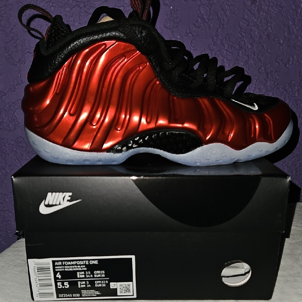 Nike Red and Black Sneakers with Futuristic Design